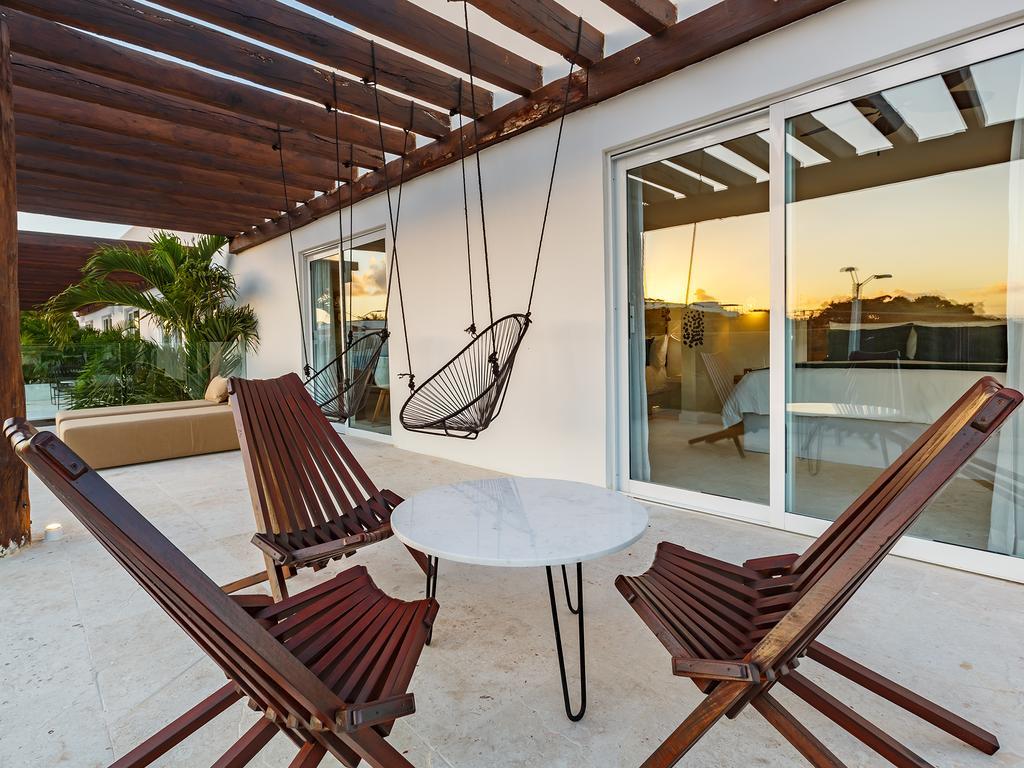 Suite Junior con terraza y vistas a la ciudad (2 adultos + 2 niños)